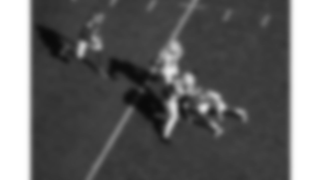 Kansas City Chiefs quarterback Patrick Mahomes (15) hits Indianapolis Colts defensive end Laiatu Latu (97) during a week 12 NFL football game, Sunday, November 23, 2025 in Kansas City, MO.