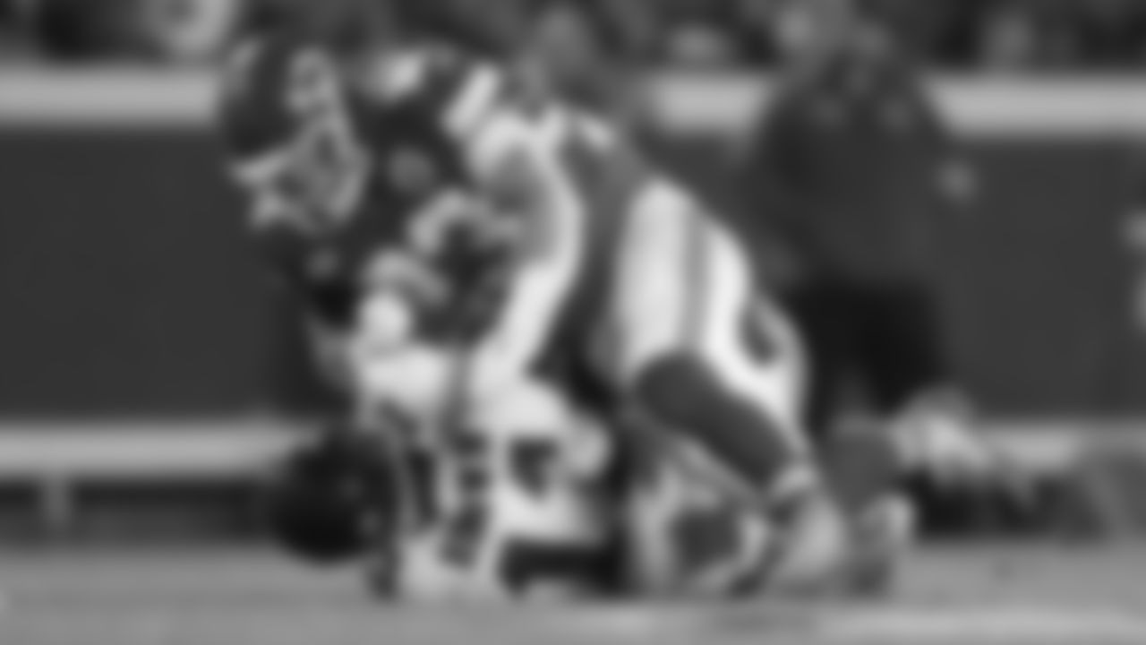 Kansas City Chiefs middle linebacker Drue Tranquill (23) makes a tackle during the week 11 NFL football game against the Philadelphia Eagles, November 20, 2023 in Kansas City.