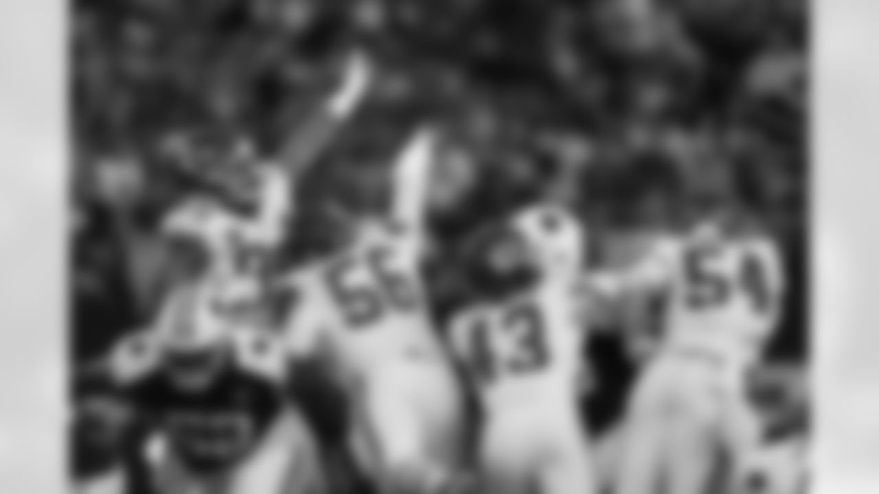 Kansas City Chiefs defensive lineman Jerry Tillery (99) and Kansas City Chiefs defensive end George Karlaftis (56) attempt to block a kick during a week 13 NFL football game against the Dallas Cowboys on Thursday, November 27, 2025 in Arlington, TX.