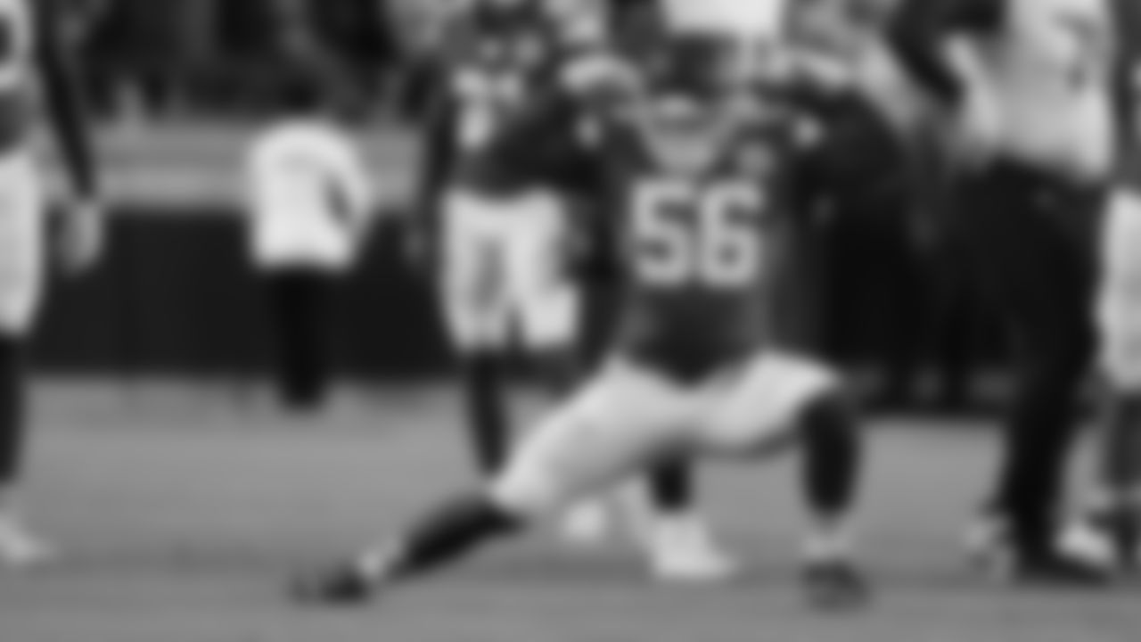 Kansas City Chiefs defensive end George Karlaftis (56) celebrates on the field during a week 8 NFL Football game against the Washington Commanders on Monday, October 27, 2025 in Kansas City, MO.