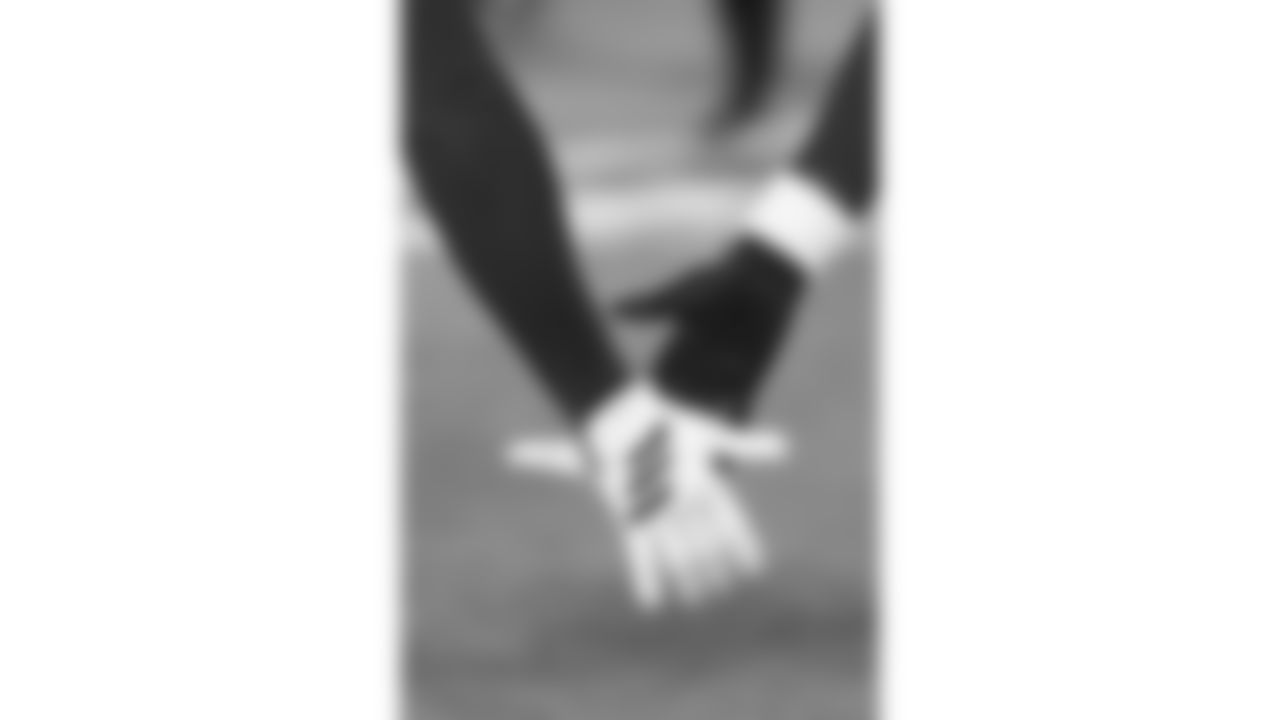 Kansas City Chiefs players high five prior to a week 8 NFL Football game against the Washington Commanders on Monday, October 27, 2025 in Kansas City, MO.