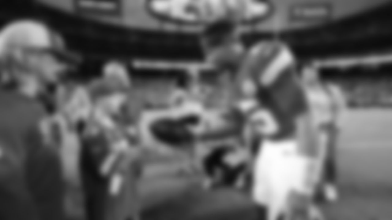 Kansas City Chiefs quarterback Patrick Mahomes (15) hands a game ball to Kingdom Champion Blake Bowman Jr. prior to a week 6 NFL Football game against the Detroit Lions on Sunday, October 12, 2025 in Kansas City, MO.