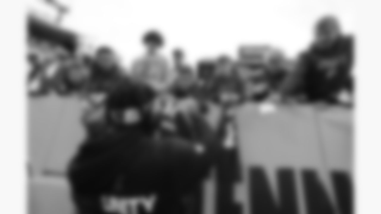 Kansas City Chiefs linebacker Jeffrey Bassa (31) signs autographs for fans prior to a week 16 NFL football game against the Tennessee Titans, Sunday, December 21, 2025 in Nashville, TN.