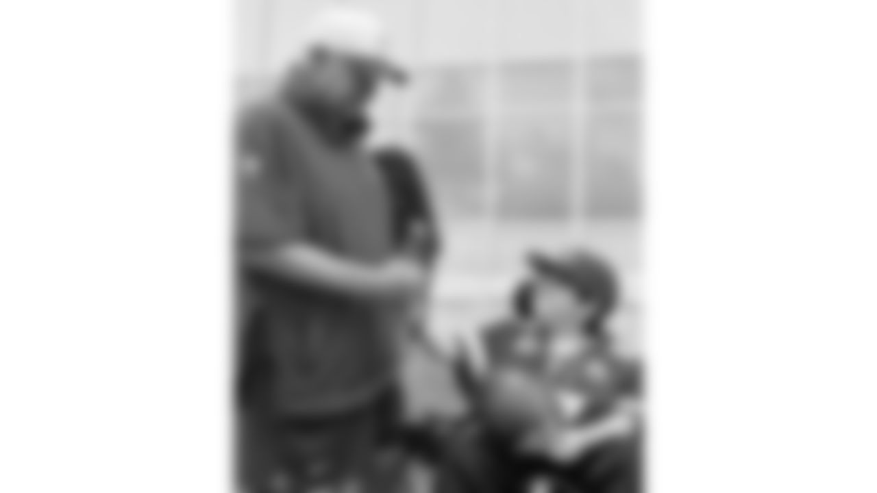 Josh "Turbo" Pham, a child battling an aggressive disease, visits practice during phase 3 of OTAs on Friday, June 13, 2025 in Kansas City, MO.