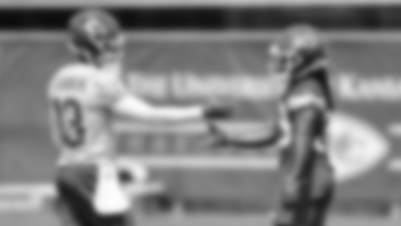 Kansas City Chiefs quarterback Chris Oladokun (13) and running back Emani Bailey (39) at practice during day 1 of minicamp on Tuesday, June 11, 2024 in Kansas City, MO.