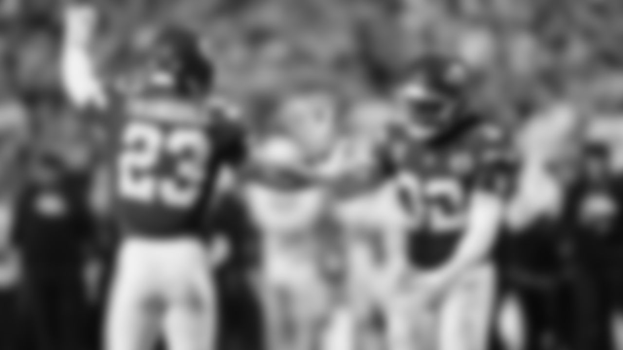 Middle linebacker Drue Tranquill (23) and Kansas City Chiefs linebacker Nick Bolton (32) celebrate during an NFL week 17 matchup against the Denver Broncos, Thursday, December 25, 2025.