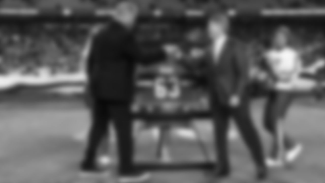 Bill Maas and Kansas City Chiefs Chairman, CEO, and Owner Clark Hunt during Bills's induction to the Chiefs Hall of Fame during halftime of NFL week 14 matchup against the Houston Texans, Sunday December 7, 2025.