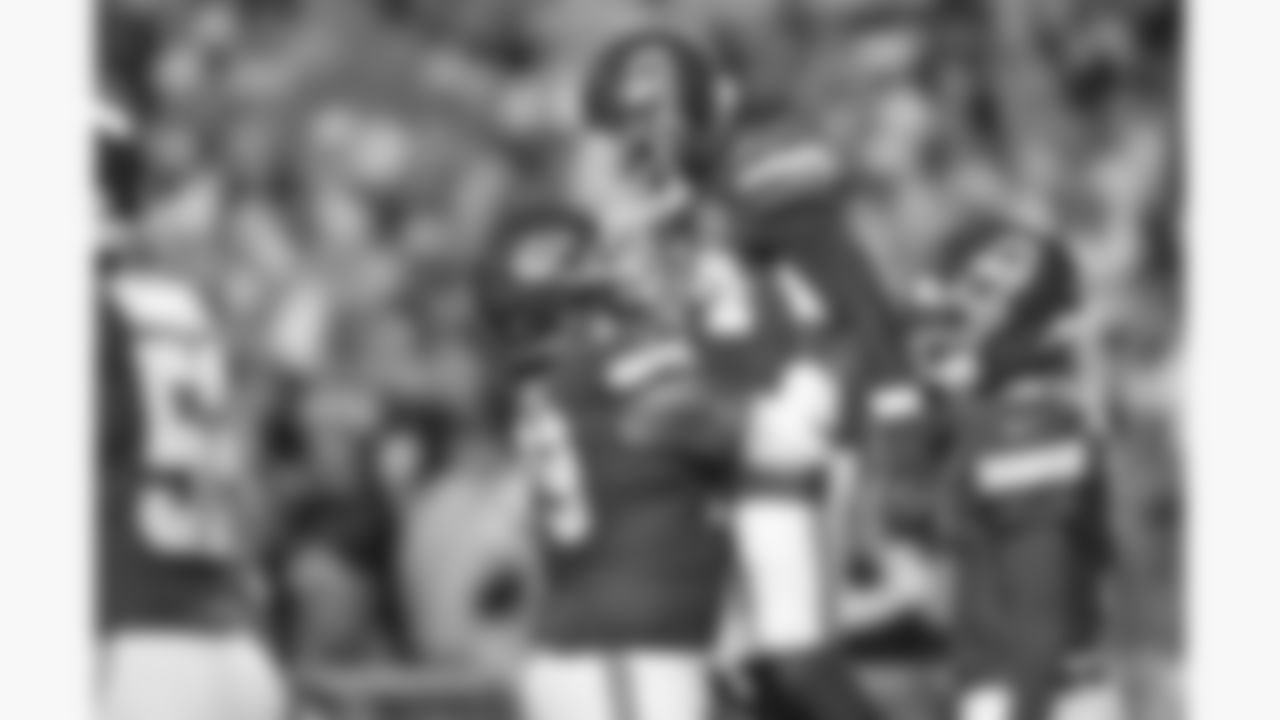 Kansas City Chiefs offensive lineman Esa Pole (79) lifts running back Brashard Smith (24) in the end zone during a week 17 NFL football game against the Denver Broncos, Thursday, December 25, 2025 in Kansas City, MO.