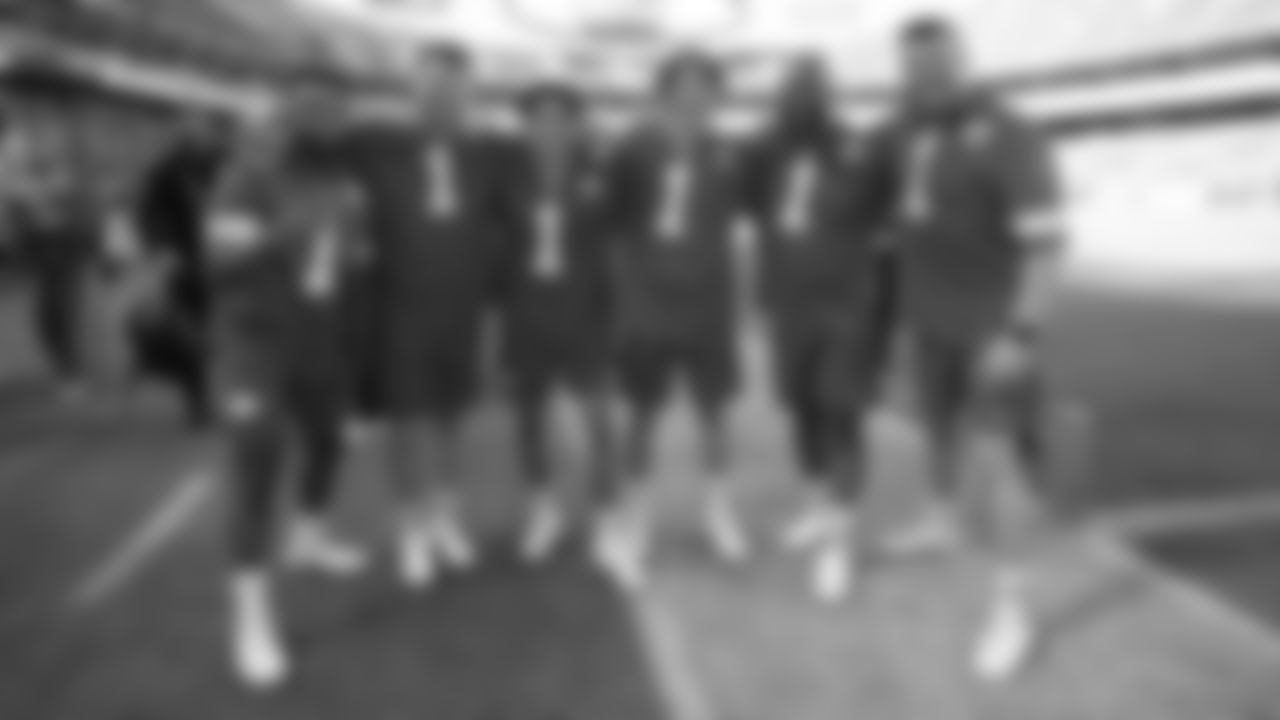 KC Flag Runners pose for a photo after a week 7 NFL Football game against the Las Vegas Raiders on Sunday, October 19, 2025 in Kansas City, MO.