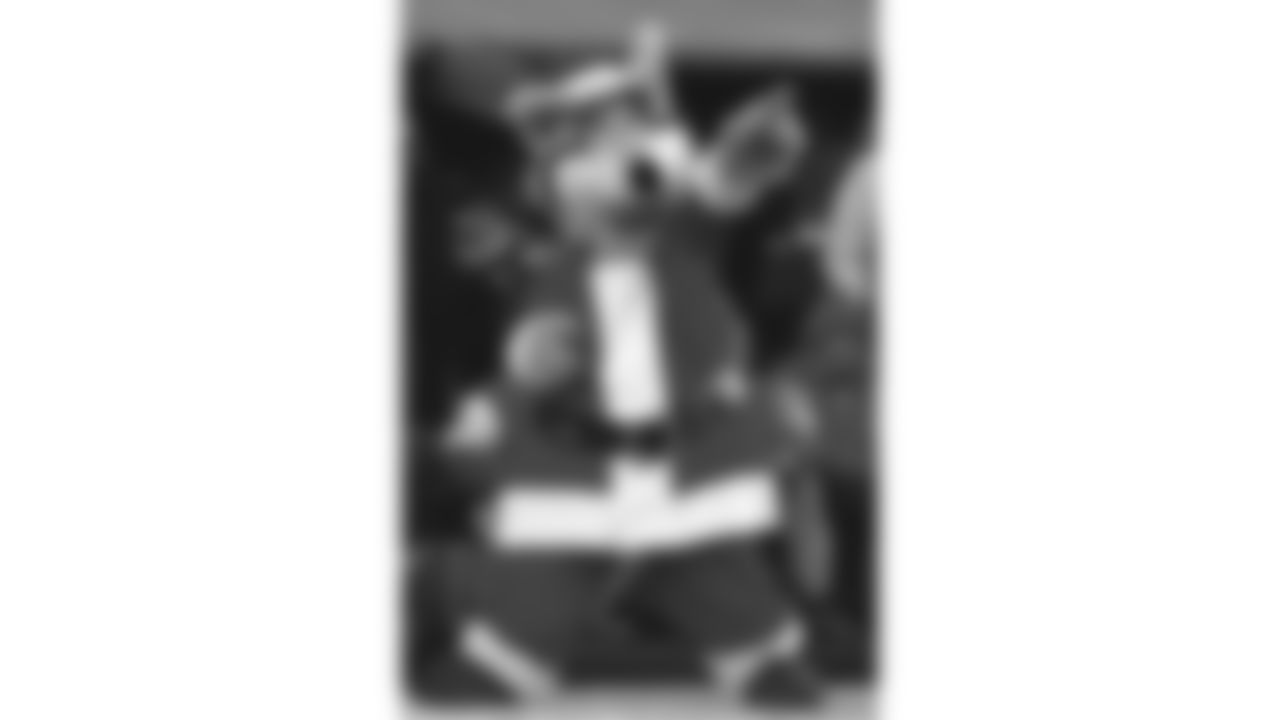 KC Wolf poses in a santa costume in 1996.