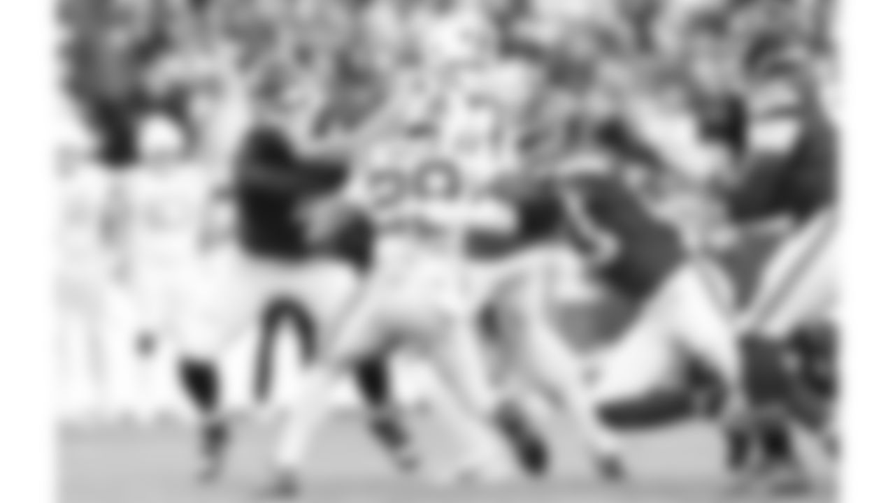 Kansas City Chiefs middle linebacker Drue Tranquill (23) hits Indianapolis Colts running back Jonathan Taylor (28) during a week 12 NFL football game, Sunday, November 23, 2025 in Kansas City, MO.