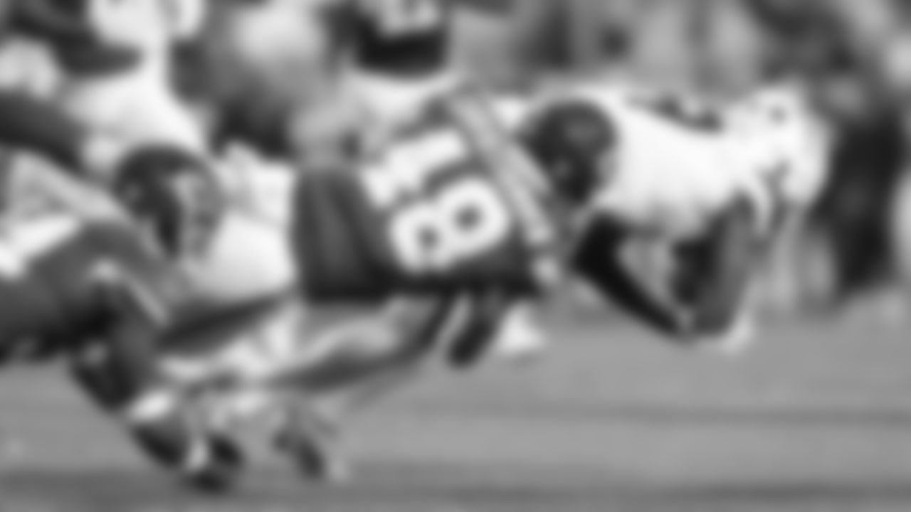 Kansas City Chiefs linebacker Cole Christiansen (48) tackles Denver Broncos wide receiver Marvin Mims Jr. (19) during a week 17 NFL football game, Thursday, December 25, 2025 in Kansas City, MO.