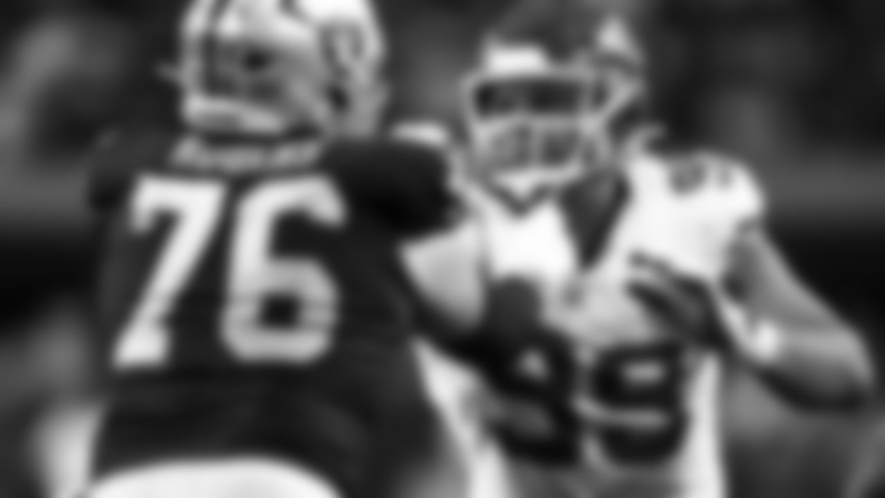 Kansas City Chiefs defensive lineman Jerry Tillery (99) rushes against Las Vegas Raiders guard Caleb Rogers (76) during a week 18 NFL football game, Sunday, January 4, 2026 in Las Vegas, NV.