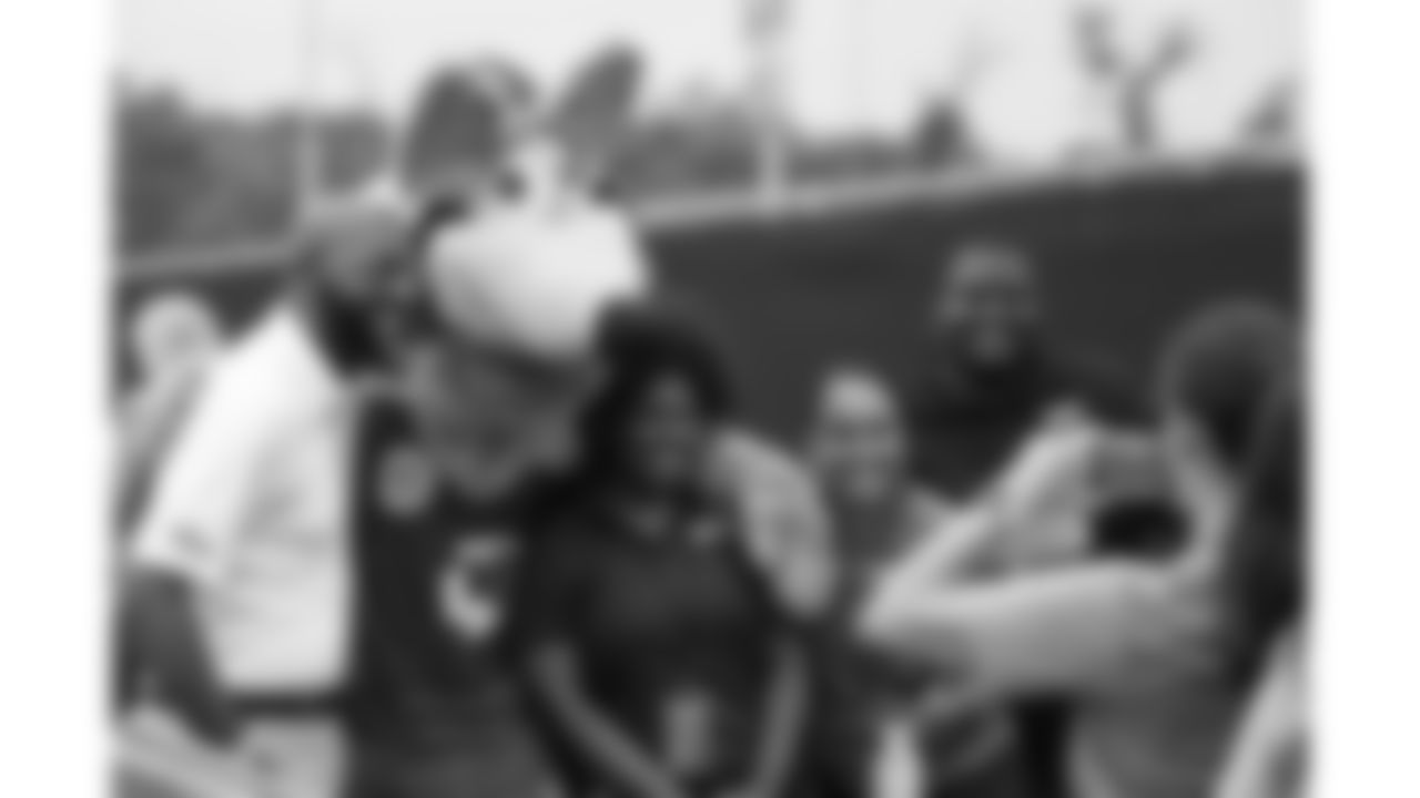 KC Wolf with Kansas City Chiefs fans during day 1 of the Season Ticket Member First Look Event on Tuesday June 17, 2025 in Kansas City, MO.