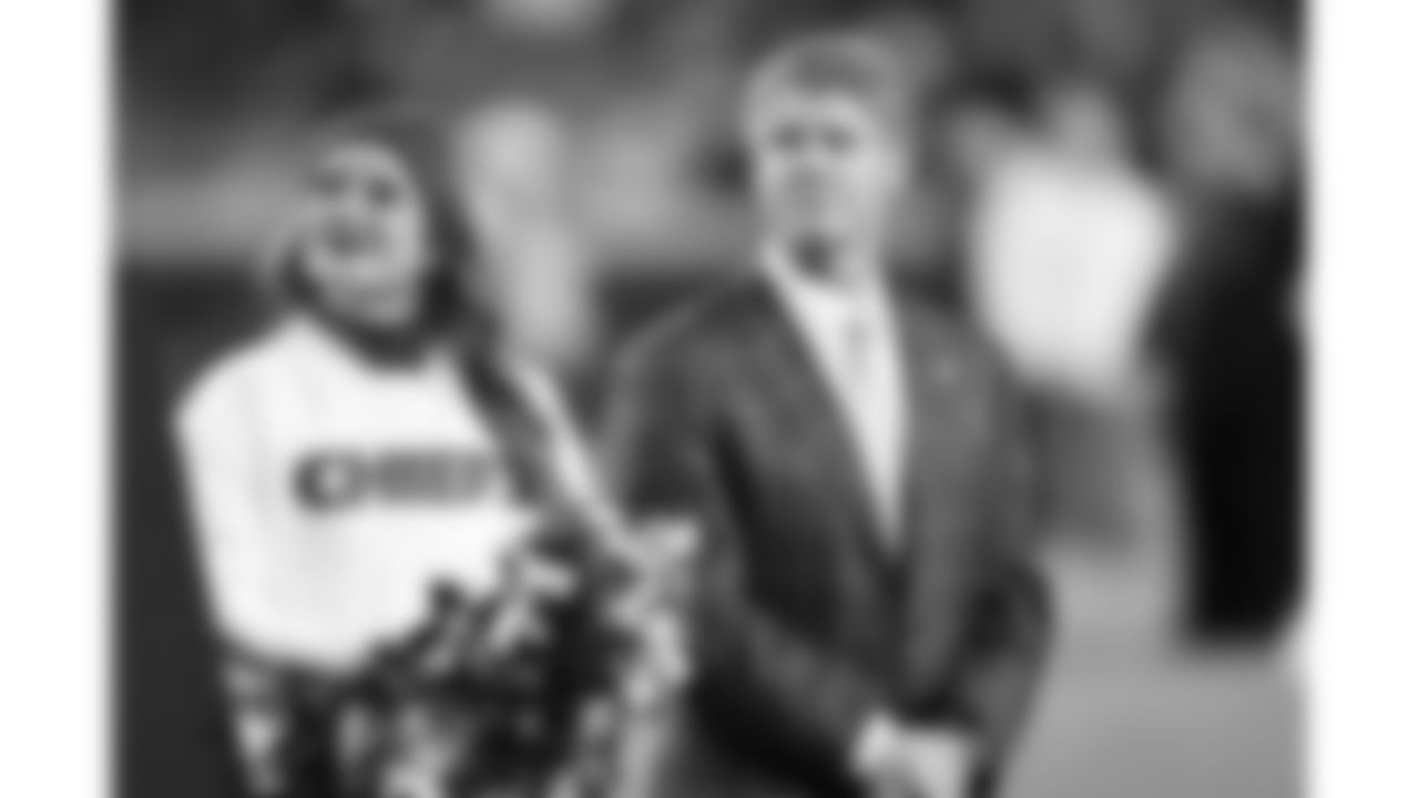 Kansas City Chiefs Chairman, CEO, and Owner Clark Hunt and a Kansas City Chiefs Cheerleader at a halftime recognition during a week 14 NFL Football game against the Houston Texans on Sunday, December 7, 2025 in Kansas City, MO.