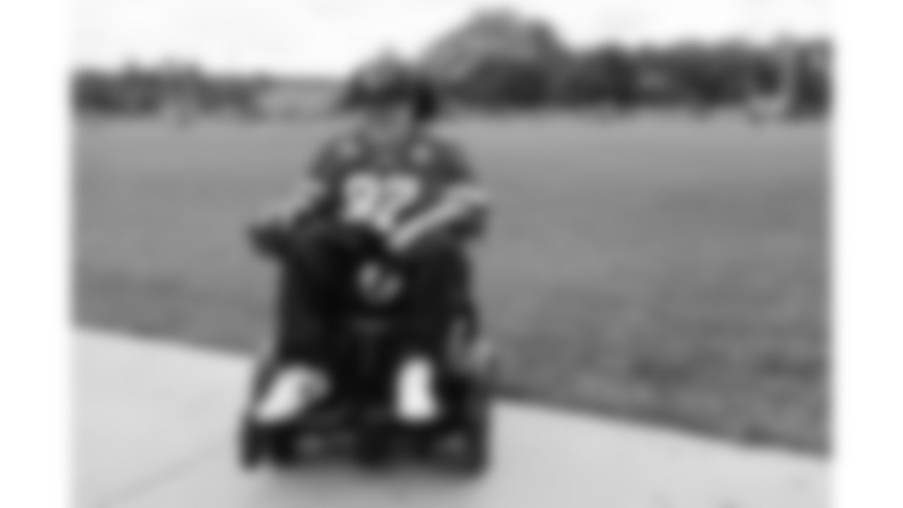 Josh "Turbo" Pham, a child battling an aggressive disease, visits practice during phase 3 of OTAs on Friday, June 13, 2025 in Kansas City, MO.