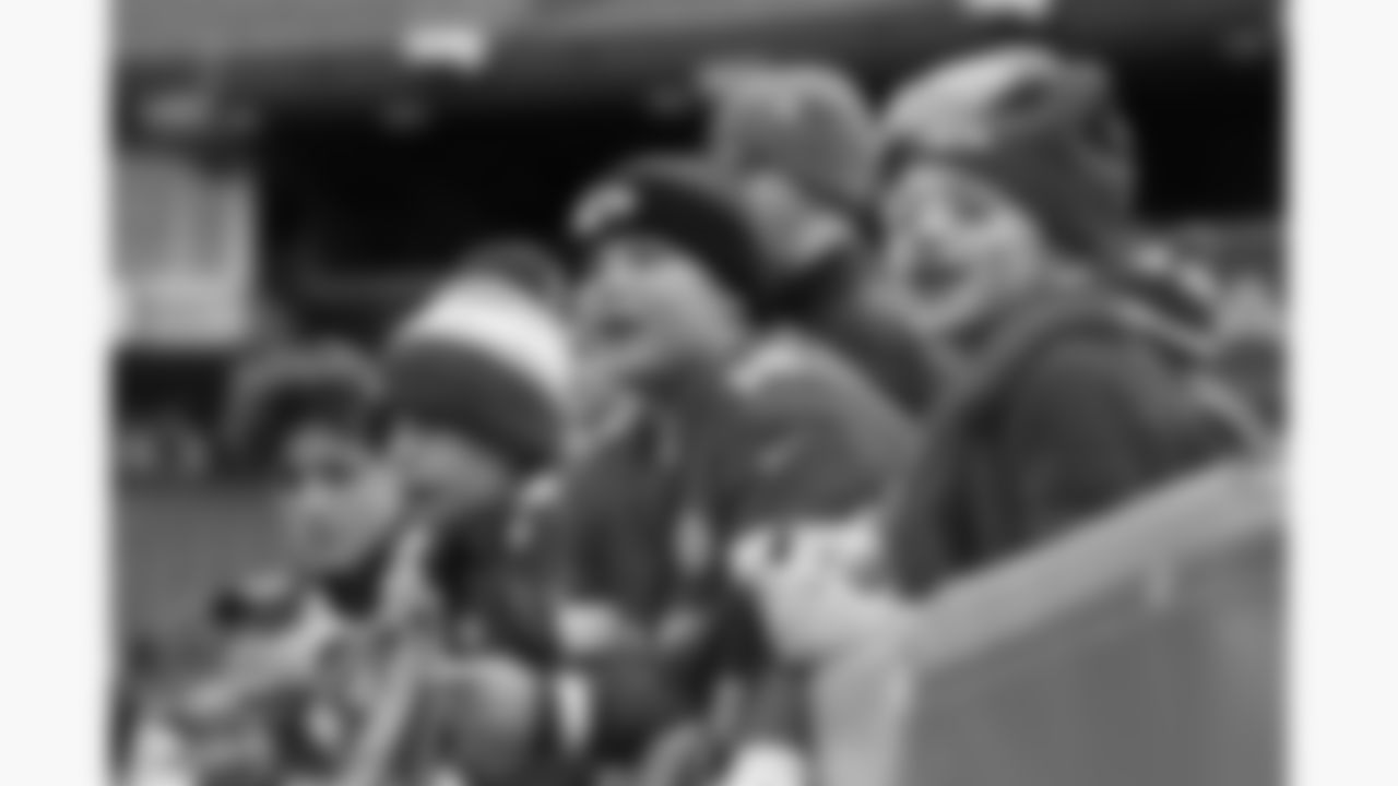 A young Kansas City Chiefs fan smiles from the stands prior to a week 16 NFL football game against the Tennessee Titans, Sunday, December 21, 2025 in Nashville, TN.