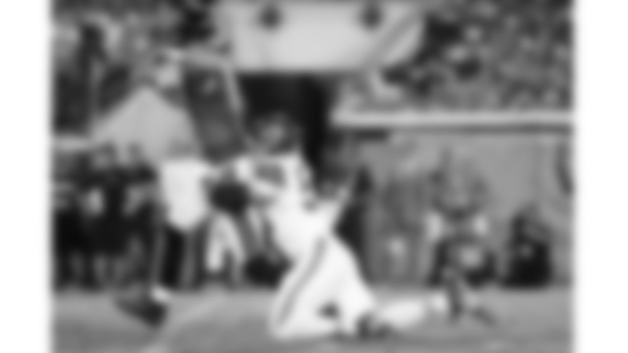 Kansas City Chiefs defensive end George Karlaftis (56) hits Jacksonville Jaguars quarterback Trevor Lawrence (16) during the week 5 NFL football game, Monday, October 6, 2025 in Jacksonville, FL.