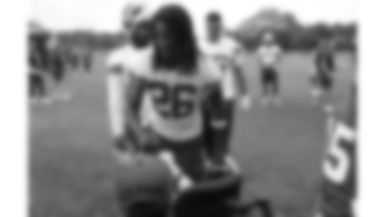 Josh "Turbo" Pham, a child battling an aggressive disease, visits practice during phase 3 of OTAs on Friday, June 13, 2025 in Kansas City, MO.