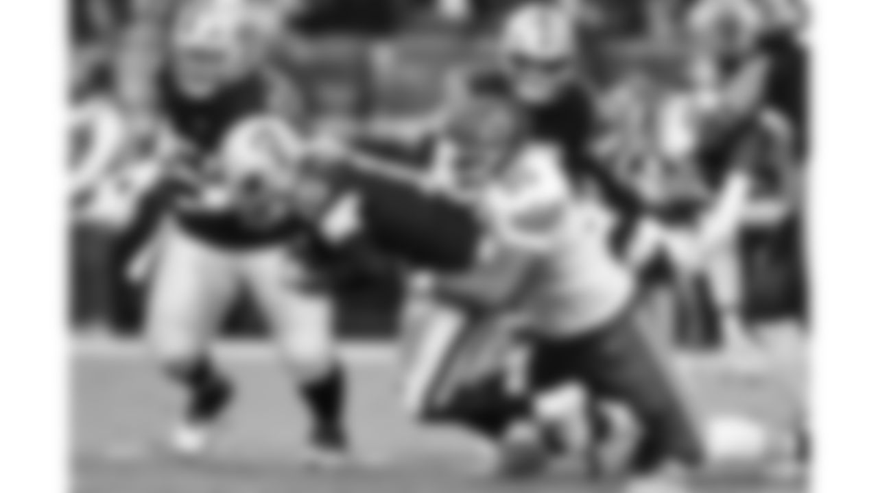 Kansas City Chiefs defensive tackle Chris Jones (95) tackles Las Vegas Raiders quarterback Kenny Pickett (15) during a week 18 NFL football game, Sunday, January 4, 2026 in Las Vegas, NV.