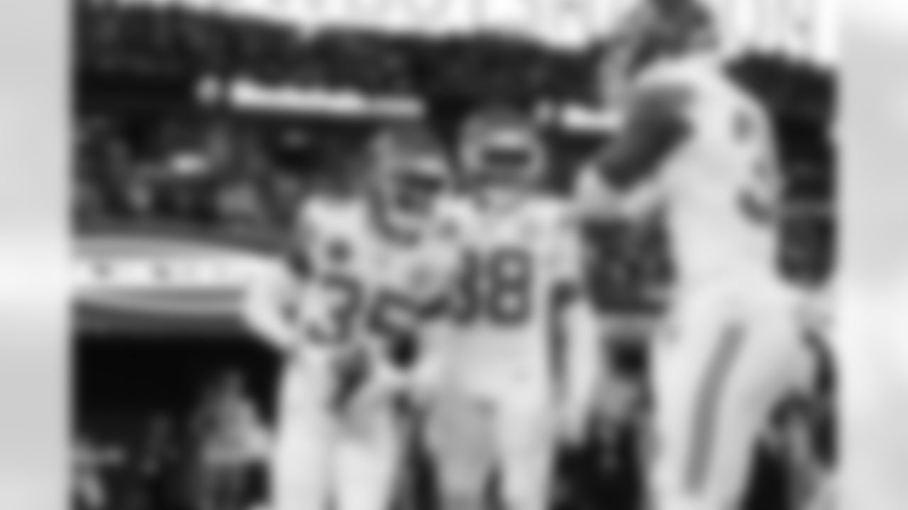 Kansas City Chiefs cornerback Jaylen Watson (35) and the defense celebrate after an interception during a week 13 NFL football game against the Dallas Cowboys on Thursday, November 27, 2025 in Arlington, TX.