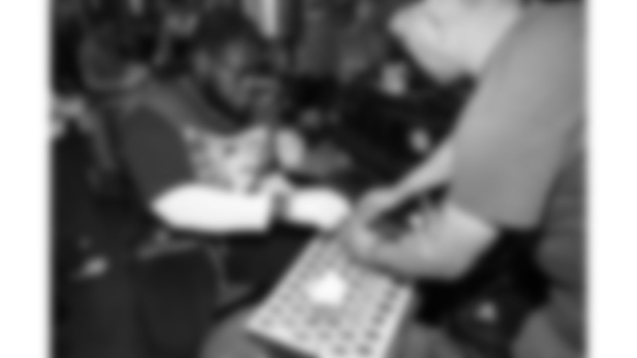 Kansas City Chiefs offensive lineman Trey Smith (65) makes fortune cookies at a local shop prior to the 2026 Pro Bowl opening night in San Francisco, California on Sunday, February 1, 2026.