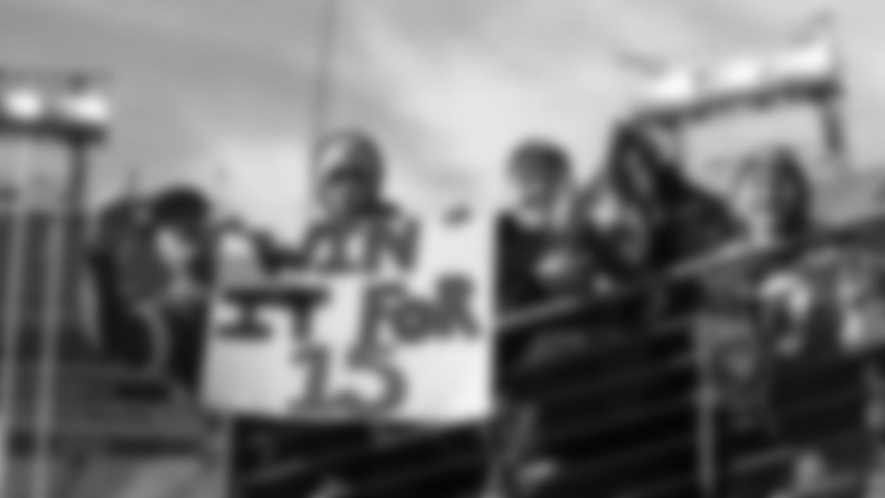 Kansas City Chiefs fans hold a sign that reads "Win it for 15" prior to a week 16 NFL football game against the Tennessee Titans, Sunday, December 21, 2025 in Nashville, TN.