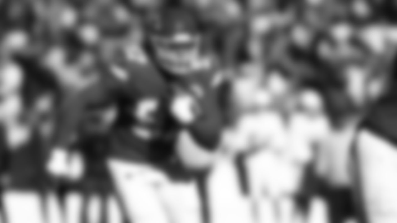 Kansas City Chiefs defensive end Ashton Gillotte (97) runs after his interception during an NFL week 15 matchup against the Los Angeles Chargers, Sunday December 14, 2025.