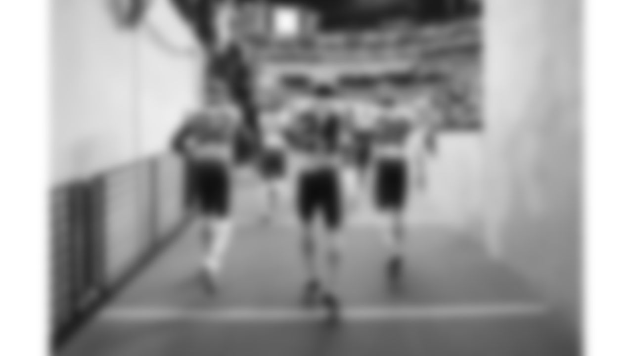 Kansas City Chiefs wide receiver Jimmy Holiday (82), wide receiver Jalen Royals (11), running back Brashard Smith (24), and defensive back Kevin Knowles (38) enter the field prior to a week 18 game against the Las Vegas Raiders on Sunday, January 3, 2026.
