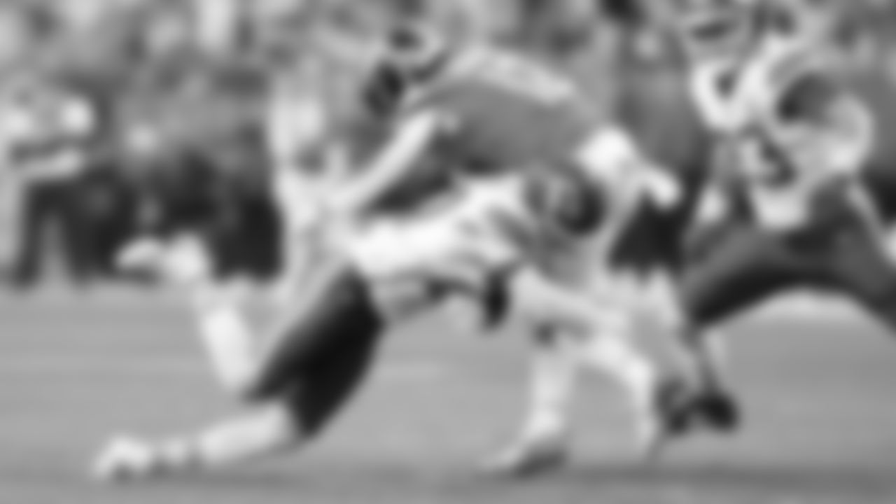 Kansas City Chiefs defensive back Chamarri Conner (27) hits Denver Broncos running back RJ Harvey (12) during a week 11 NFL football game, Sunday, November 16, 2025 in Denver, CO.