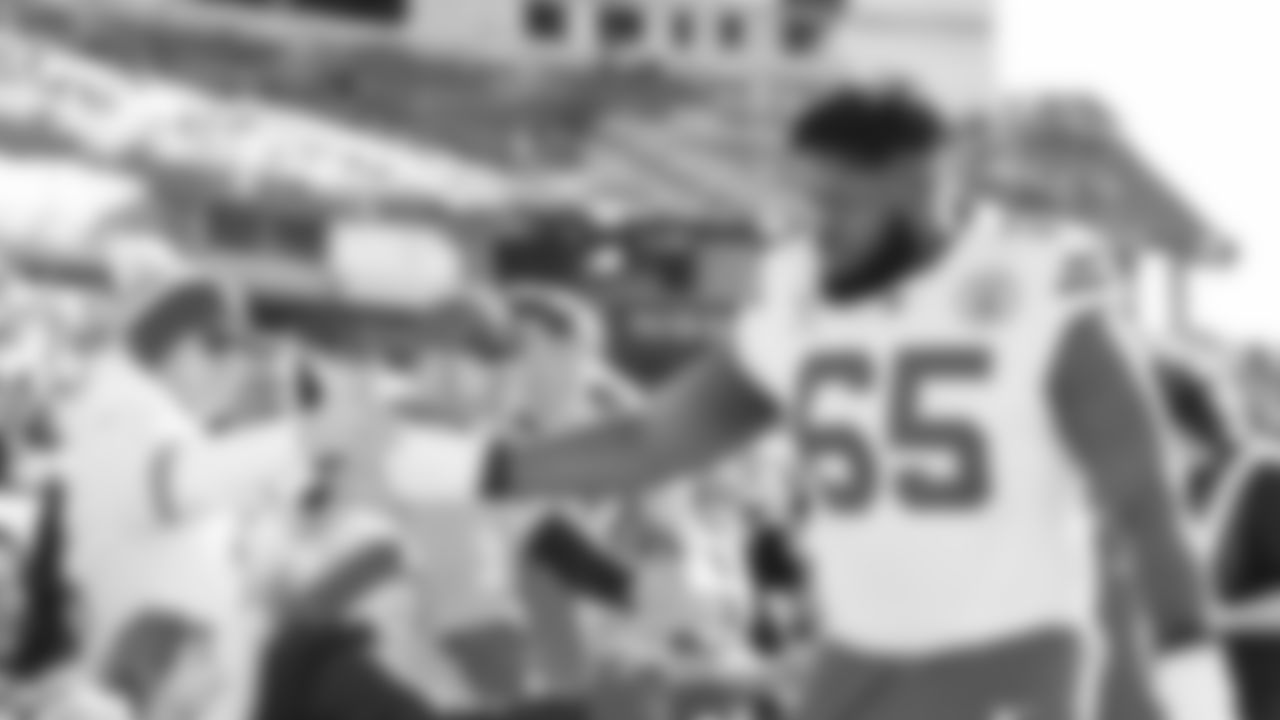 Kansas City Chiefs offensive lineman Trey Smith (65) high fives fans prior to a week 16 NFL Football game against the Tennessee Titans on Sunday, December 21, 2025 in Nashville, Tennessee.