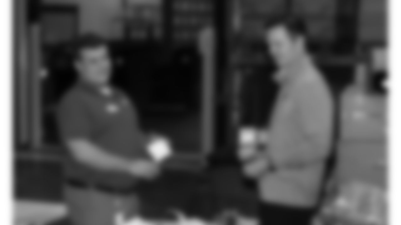 Kansas City Chiefs President Mark Donovan and Chiefs staff volunteer at the annual Souper Bowl at the Harvesters Community Food Network in Kansas City on Tuesday, February 4, 2026.