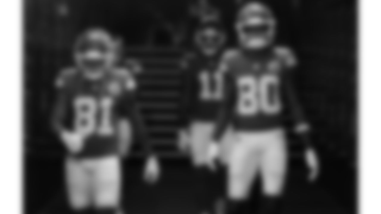 Kansas City Chiefs wide receiver Nikko Remigio (81) and wide receiver Tyquan Thorton (80) walk down the 50-yard tunnel at GEHA Field at Arrowhead Stadium prior to a week 6 NFL football game against the Detroit Lions, Sunday, October 12, 2025 in Kansas City, MO.