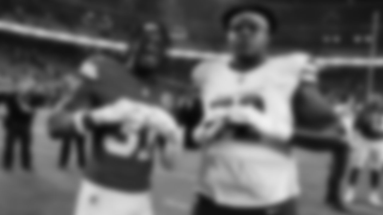 Kansas City Chiefs linebacker Jeffrey Bassa (31) poses for a photograph with Washington Commanders tackle Josh Conerly Jr. after a week 8 NFL Football game against the Washington Commanders on Monday, October 27, 2025 in Kansas City, MO.