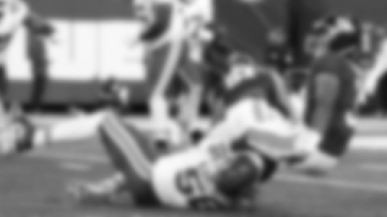 Kansas City Chiefs defensive end George Karlaftis (56) sacks New York Giants quarterback Russell Wilson (3) during the week 3 NFL football game, Sunday, September 21, 2025 in East Rutherford, NJ.