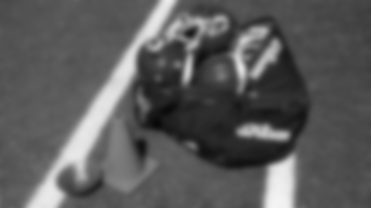 The Kansas City Chiefs quarterbacks helmets sit on the field after day 7 of training camp practice on Tuesday, July 29, 2025.