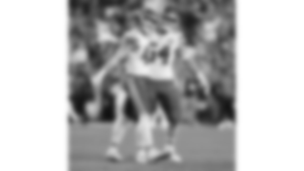 Kansas City Chiefs linebacker Jack Cochrane (43) and linebacker Leo Chenal (54) celebrate during a week 11 NFL Football game against the Denver Broncos on Sunday, November 16, 2025 in Denver, Colorado.