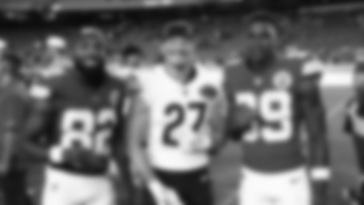 Kansas City Chiefs wide receiver Jimmy Holiday (82), Chicago Bears linebacker Swayze Bozeman (27) and wide receiver Jason Brownlee (89) after a preseason week 3 NFL football game against the Chicago Bears, Friday, August 22, 2025 in Kansas City, MO.