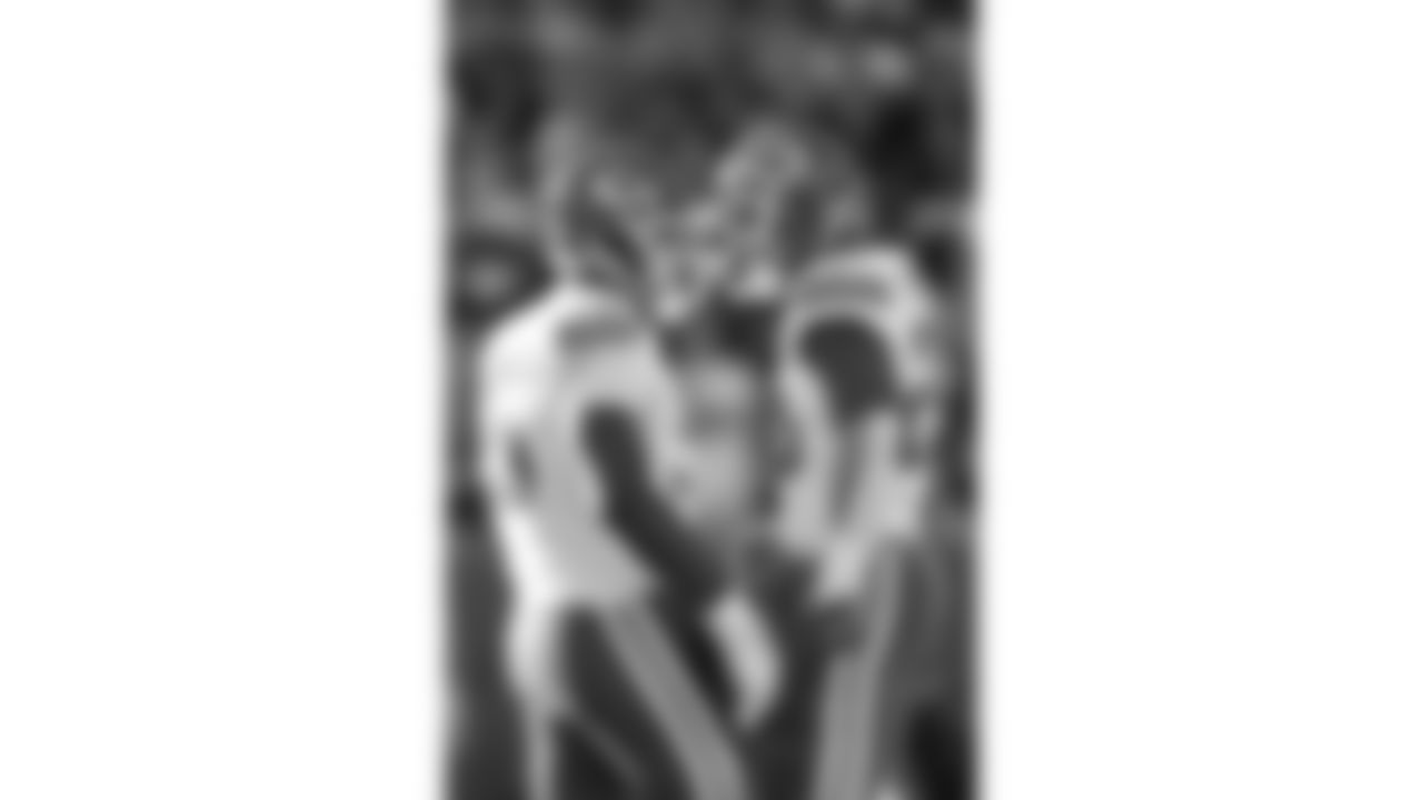 Kansas City Chiefs defensive tackle Chris Jones (95) and middle linebacker Drue Tranquill (23) celebrate during a week 11 NFL Football game against the Denver Broncos on Sunday, November 16, 2025 in Denver, Colorado.