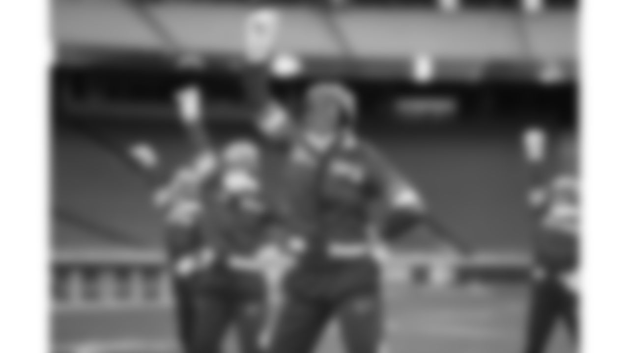 Kansas City Chiefs Cheerleaders practice on the field prior to a week 15 NFL Football game against the Los Angeles Chargers on Sunday, December 14, 2025 in Kansas City, MO.