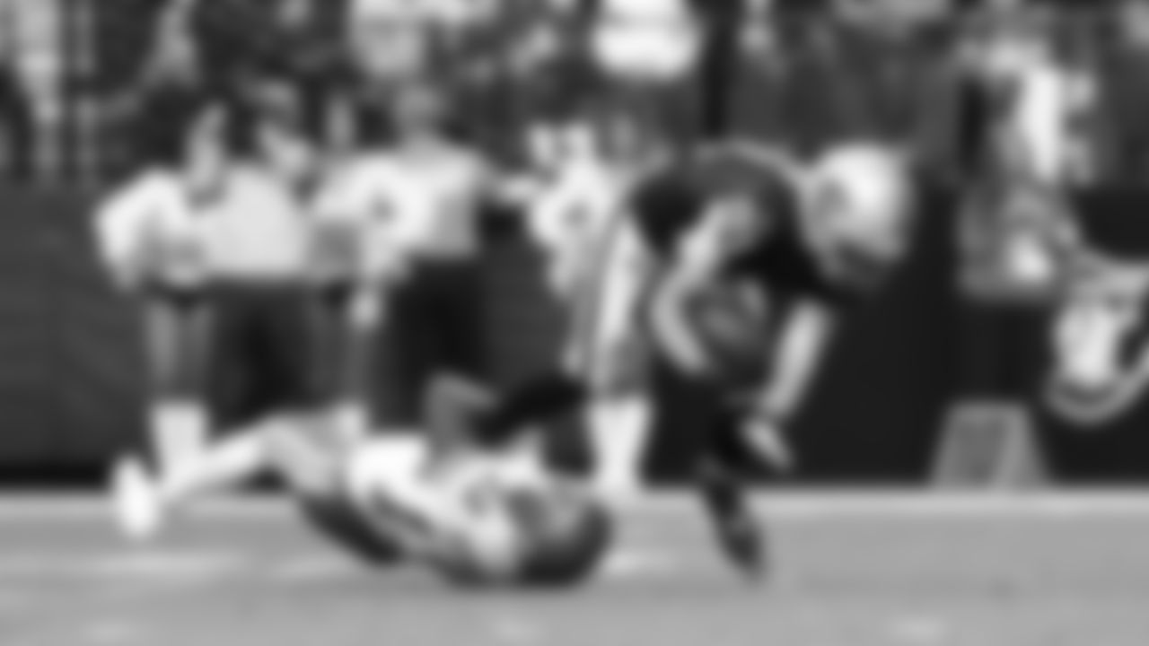 Kansas City Chiefs safety Nazeeh Johnson (13) tackles Las Vegas Raiders wide receiver Alex Bachman (81) during a week 18 NFL football game, Sunday, January 4, 2026 in Las Vegas, NV.