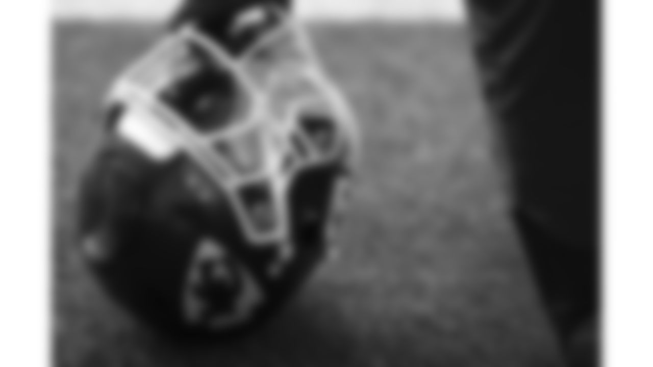 A Kansas City Chiefs player kneels next to their helmet during a week 16 practice on Thursday, December 18, 2025 in Kansas City, MO.