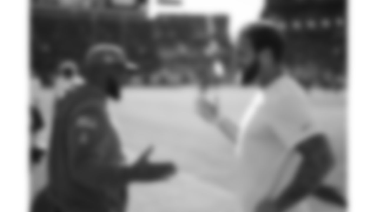 Kansas City Chiefs tight end Noah Gray (83) and Team Chaplain Marcellus Casey prior to a week 11 NFL Football game against the Denver Broncos on Sunday, November 16, 2025 in Denver, Colorado.