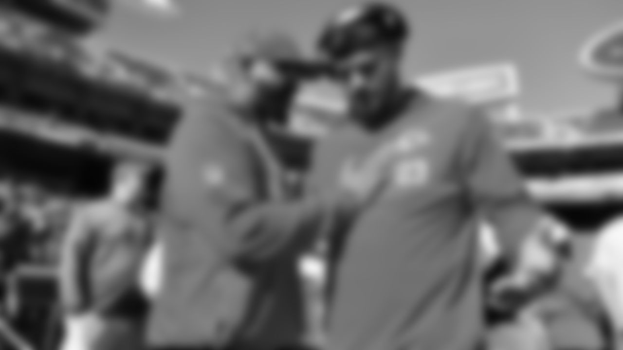 Team Chaplin Marcellus Casey and Kansas City Chiefs linebacker Drue Tranquill (23) pray prior to a week 7 NFL Football game against the Las Vegas Raiders on Sunday, October 19, 2025 in Kansas City, MO.