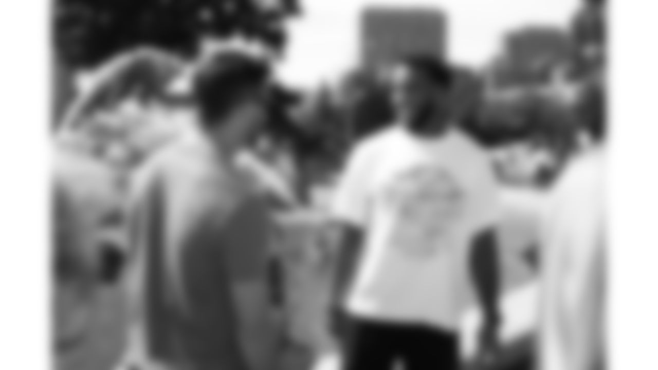 Jaden Hicks interacts with attendees of the Bradens Hope Hero Parade and Fountain Dyeing event on Friday, August 29, 2025 at Mill Creek Park in Kansas City, MO.