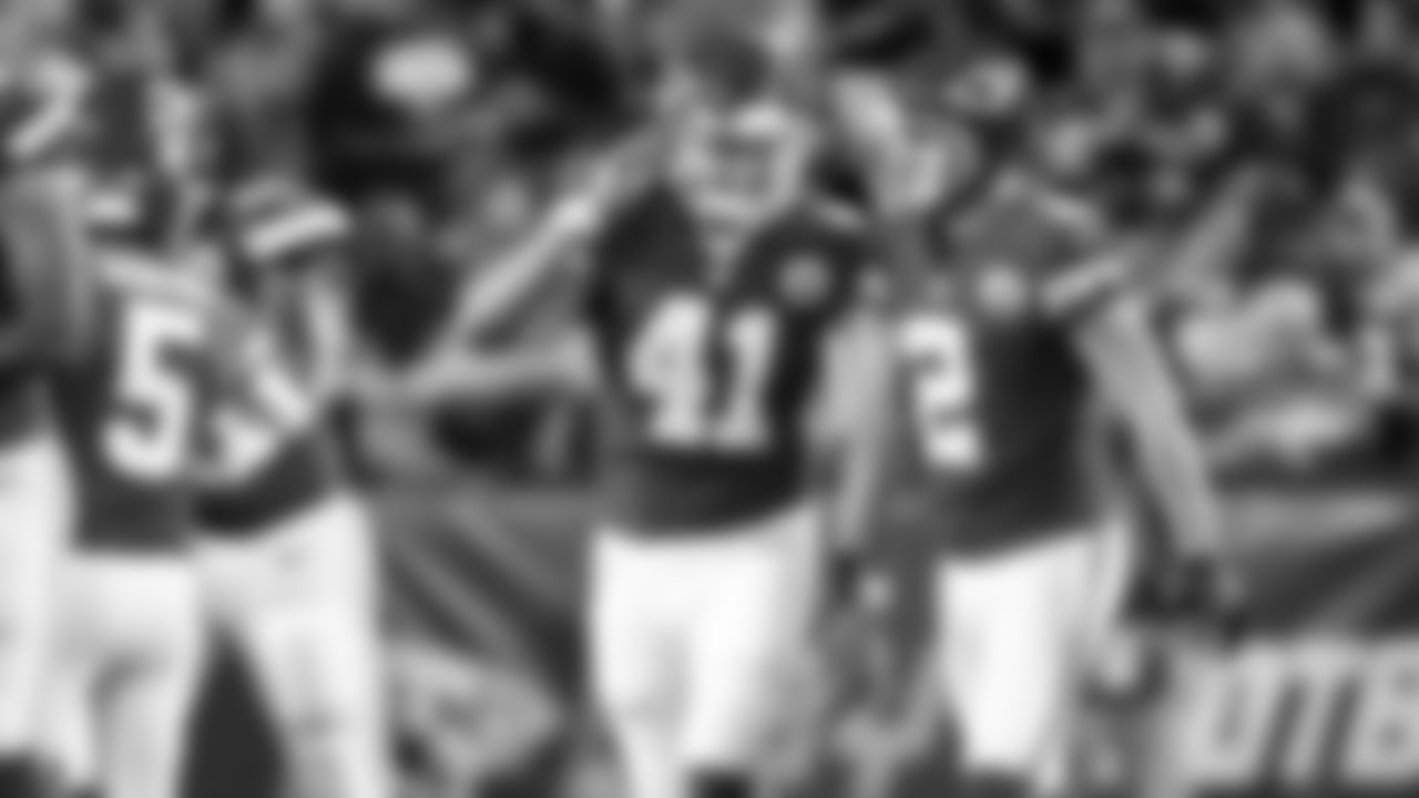 Kansas City Chiefs long snapper James Winchester (41) speaks with punter Dustin Colquitt (2) during the preseason game against the Green Bay Packers, Thursday, September 1, 2016, in Kansas City, Missouri.