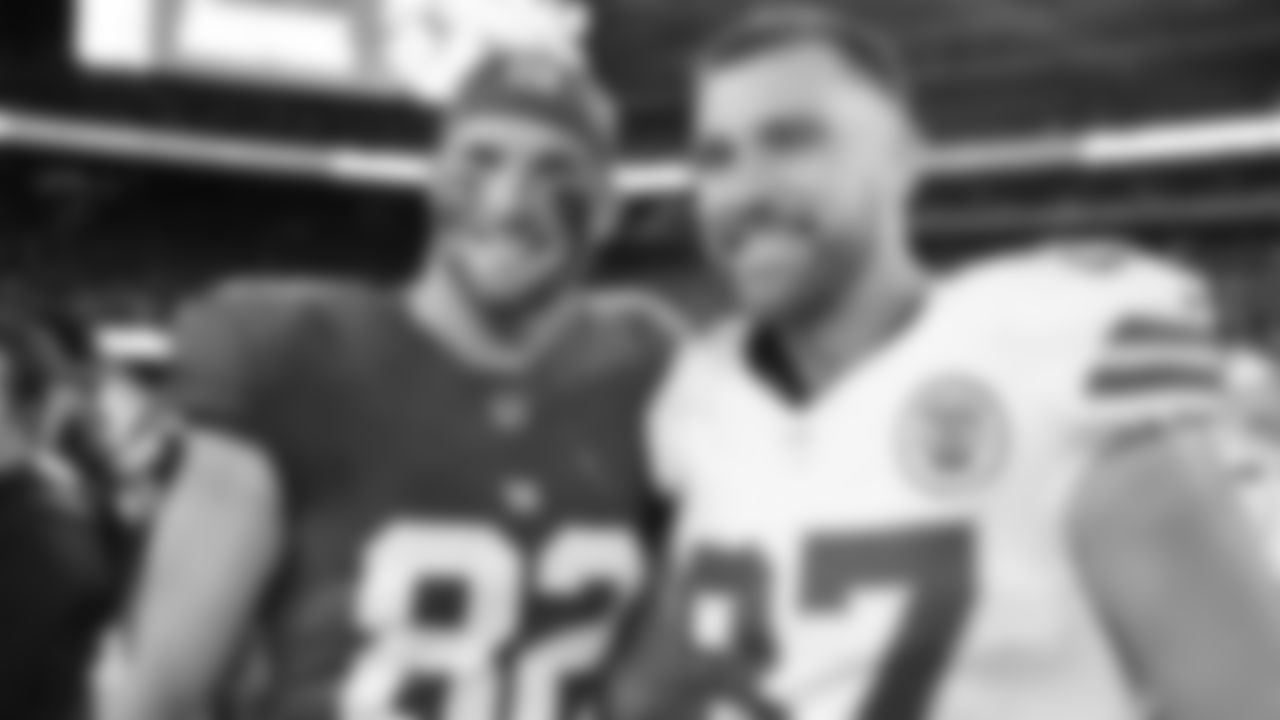 Kansas City Chiefs tight end Travis Kelce (87) and New York Giants tight end Daniel Bellinger (82) after a week 3 NFL Football game against the New York Giants on Sunday, September 21, 2025 at MetLife Stadium in East Rutherford, New Jersey.