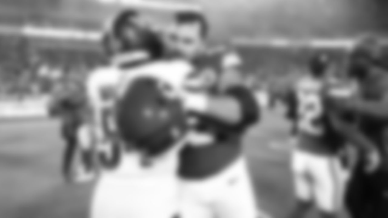 Kansas City Chiefs offensive lineman Michael Caliendo (66) hugs Washington Commanders linebacker Bobby Wagner (54) after a week 8 NFL Football game against the Washington Commanders on Monday, October 27, 2025 in Kansas City, MO.