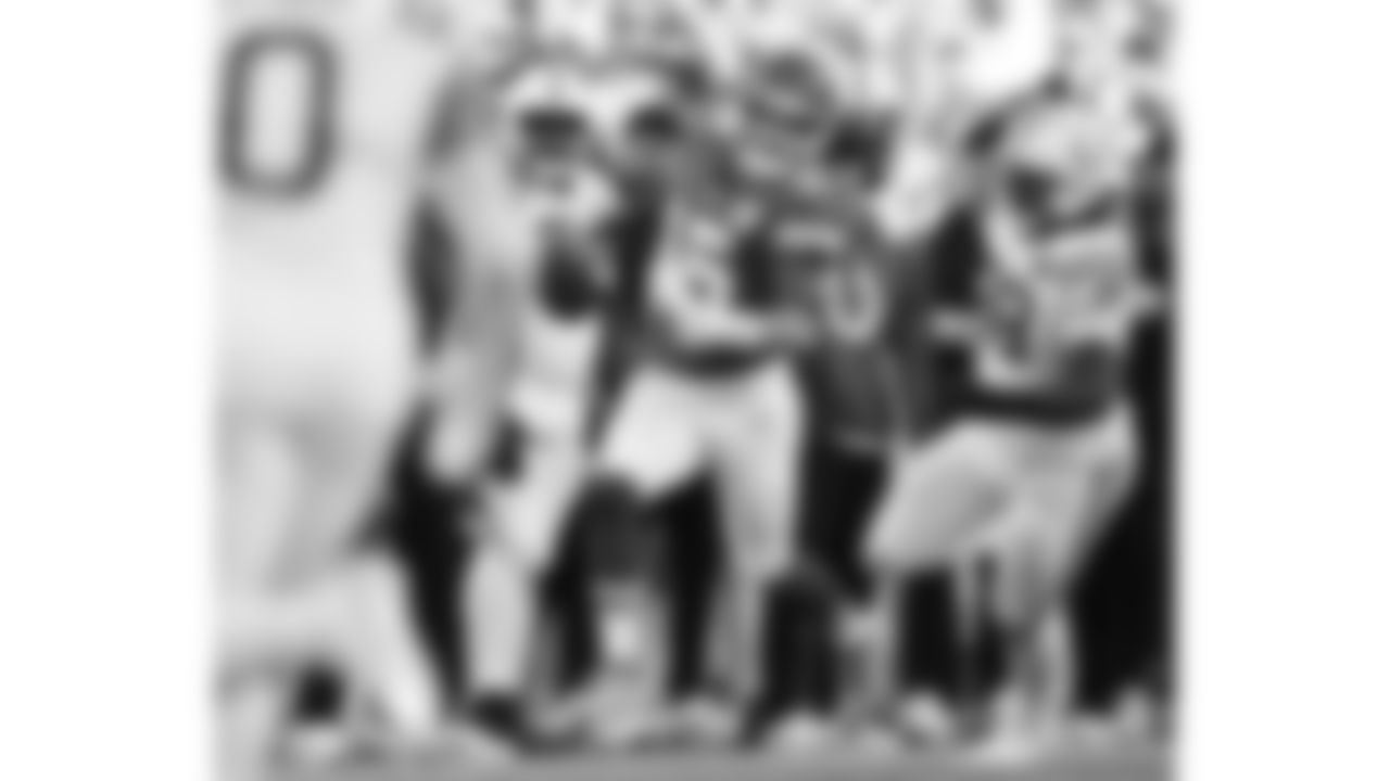 Kansas City Chiefs quarterback Patrick Mahomes (15) runs with the ball in front of Indianapolis Colts defensive tackle Eric Johnson II (98) during a week 12 NFL football game, Sunday, November 23, 2025 in Kansas City, MO.