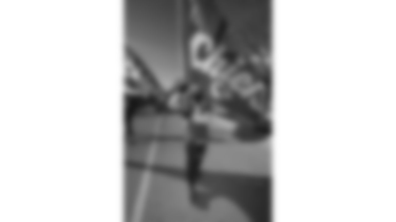 Chiefs Flag Runners prior to a week 15 NFL Football game against the Los Angeles Chargers on Sunday, December 14, 2025 in Kansas City, MO.